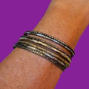 3/$30 Set of Seven Thin Stackable Metal Bangle Bracelets